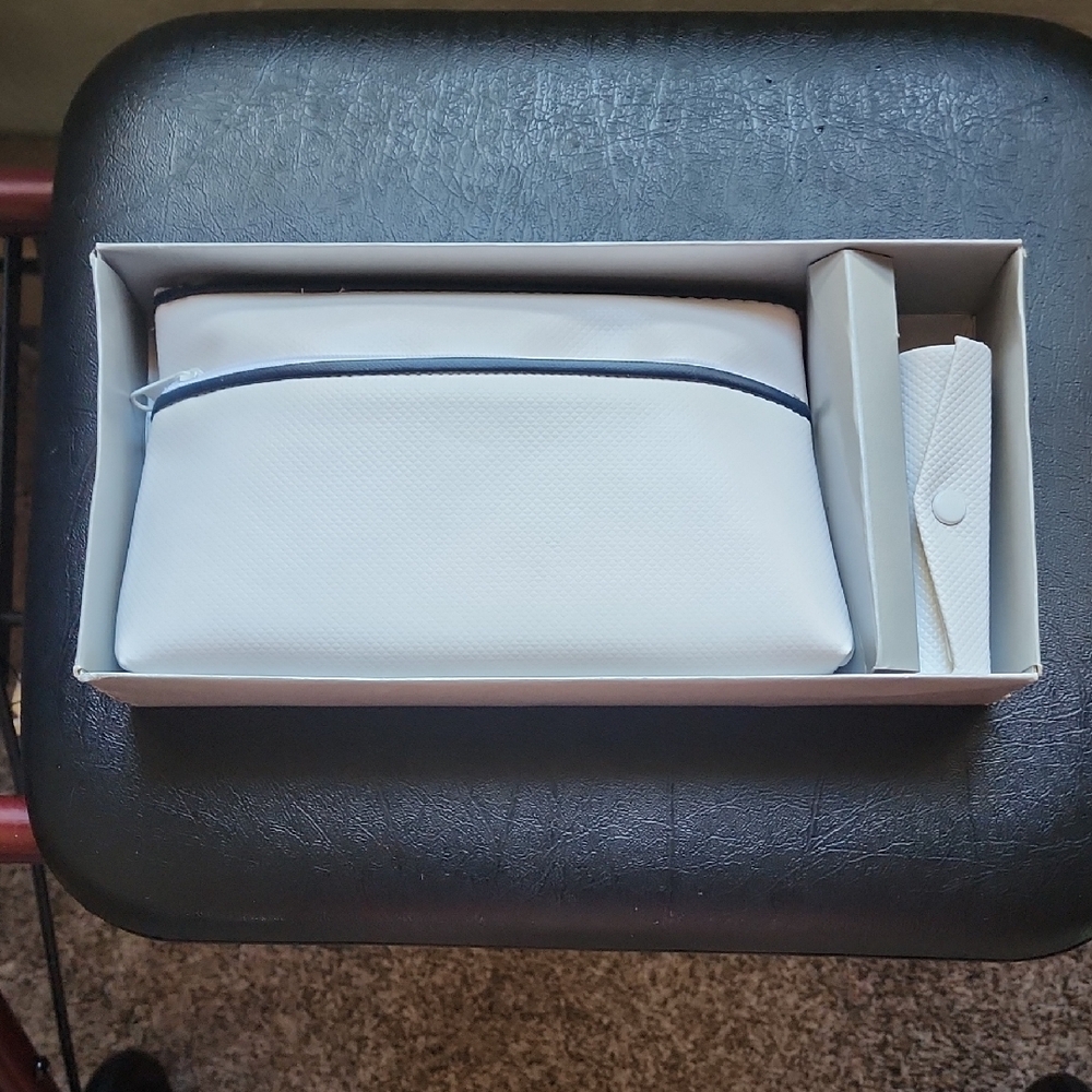 Elegant White Toiletry Bag with Navy Accent